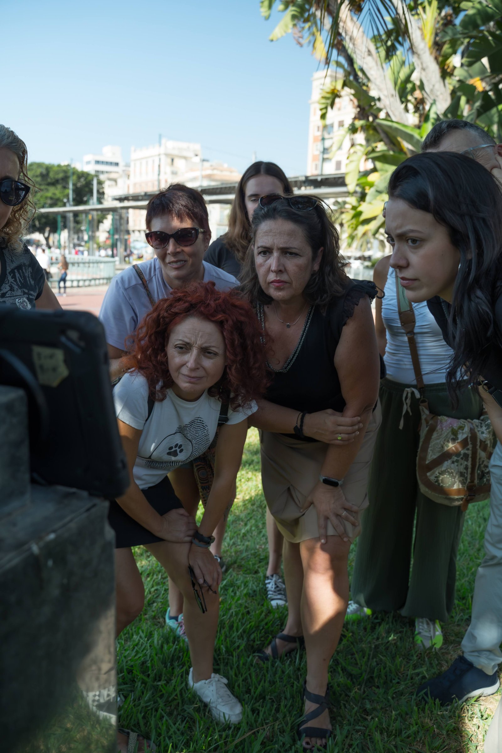 Colleagues solving escape game puzzles
